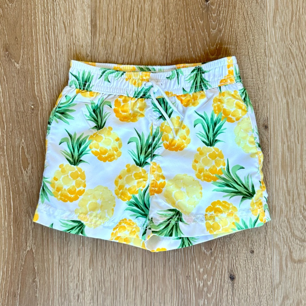 Janie & Jack pineapple swim trunks - size 6-12 months - NEVER WORN